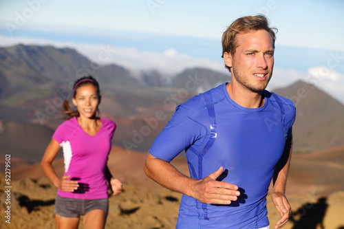 Runners trail running athletes young couple