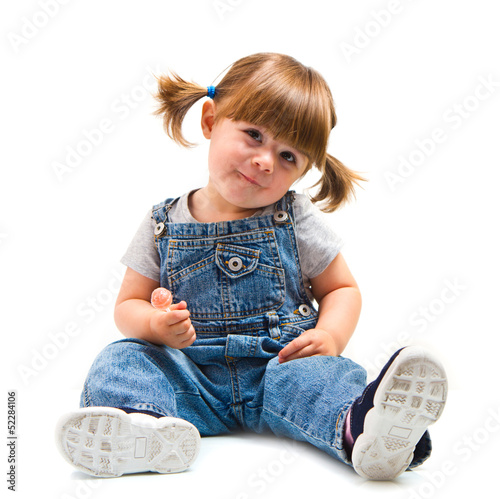 bambina con lecca lecca photo