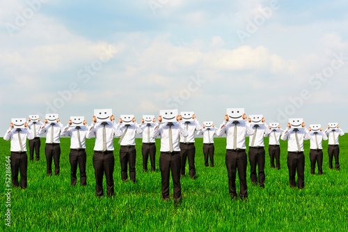 businessmen hiding their faces