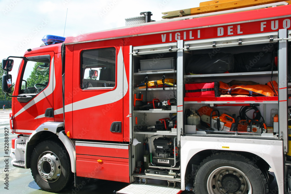 fire truck parked after switching off of a fire fire truck parked after switching off of a fire