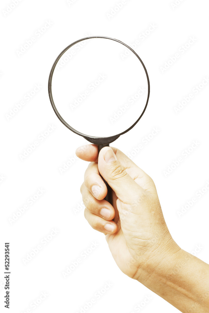 Hand holding magnifying glass isolated on white background Hand holding magnifying glass isolated on white background