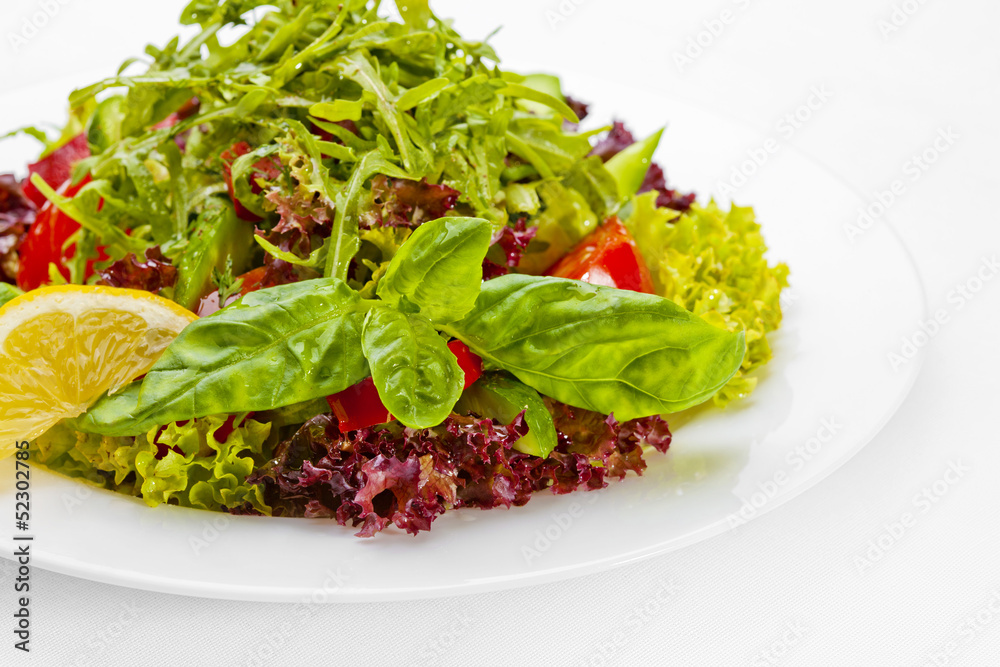 Vegetable salad over white background. High quality image Vegetable salad over white background. High quality image