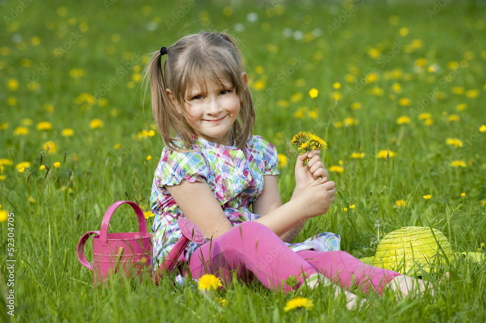 Mädchen in einer Frühlingswiese Mädchen in einer Frühlingswiese