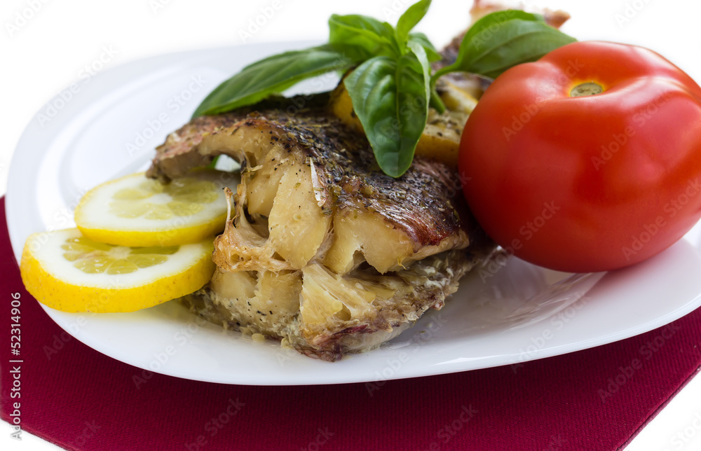 Served grilled fish with lemon Served grilled fish with lemon