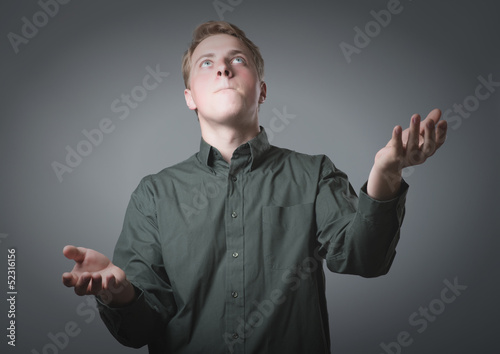 Young businessman juggling