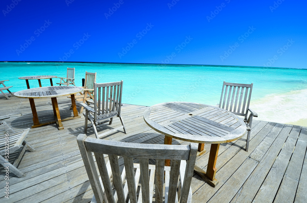 Chairs in beach restaurant