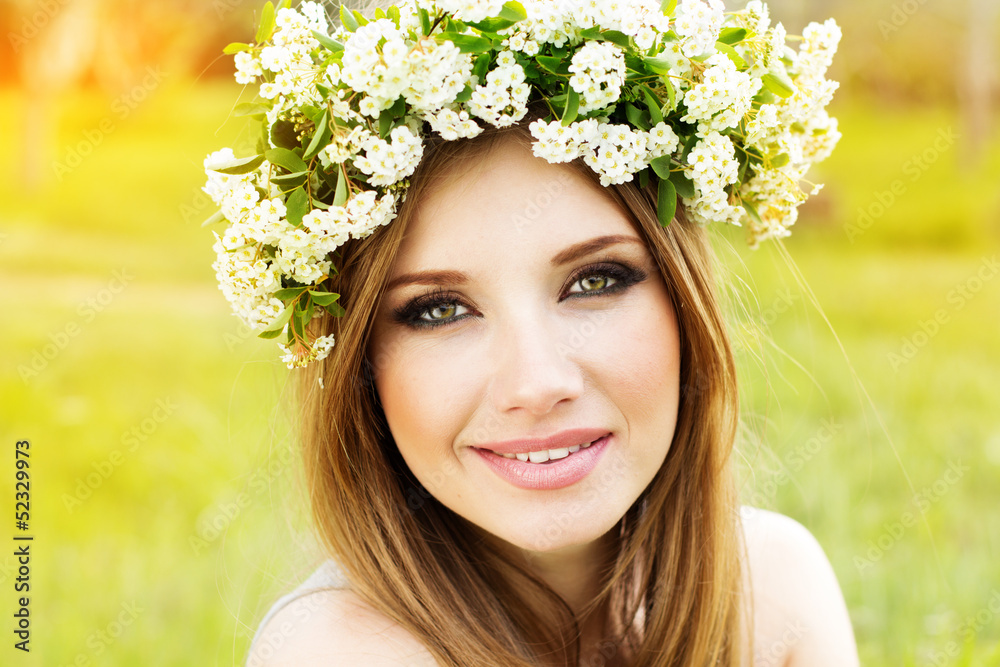 Fototapeta premium beautiful girl in wreath of flowers