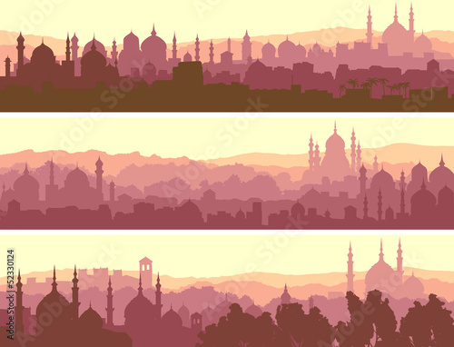 Horizontal banners of big arab city at sunset.
