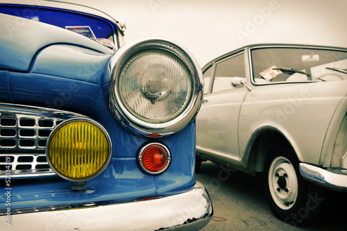 Billede på lærred Front of old blue car, sixties style, retro