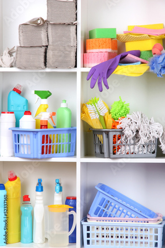 Shelves in pantry with  cleaners for home close-up © Africa Studio