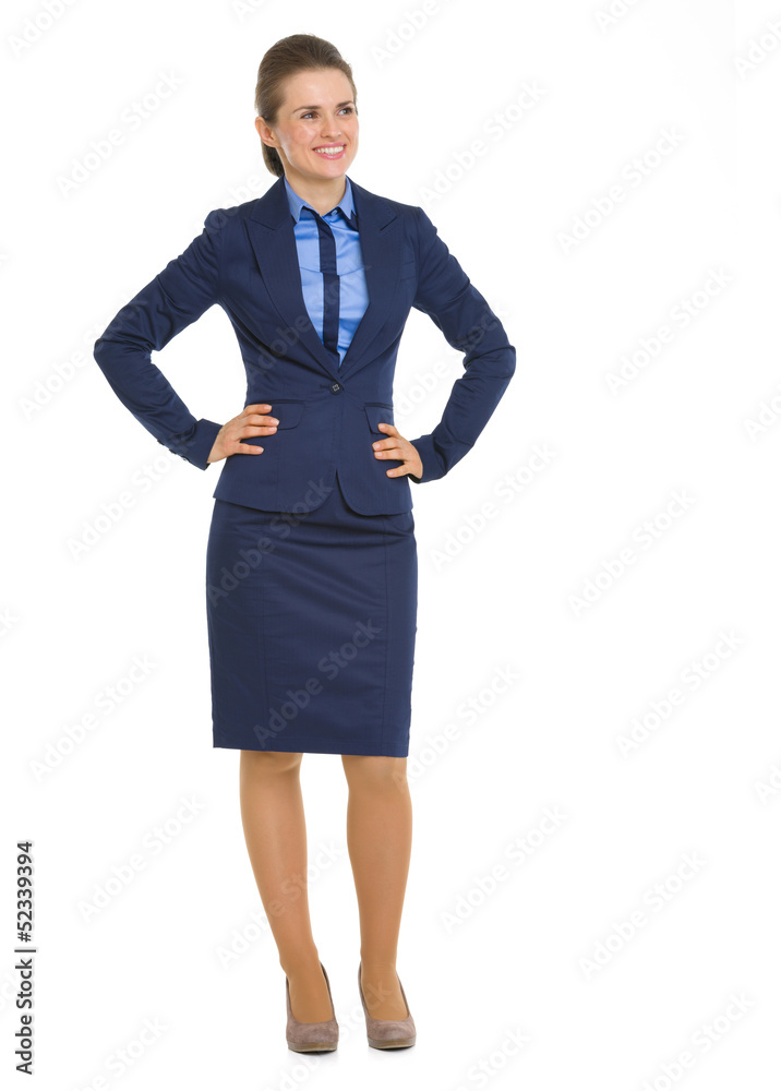 Full length portrait of business woman looking on copy space Full length portrait of business woman looking on copy space