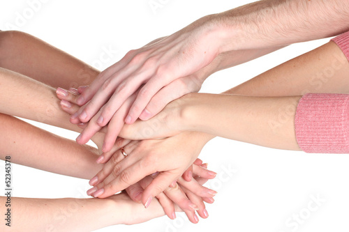 group of young people's hands isolated on white © Africa Studio