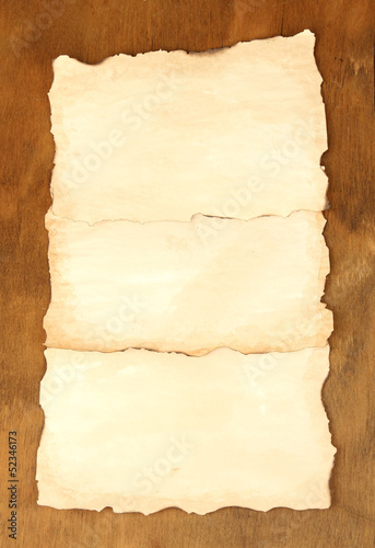 Old papers on wooden background