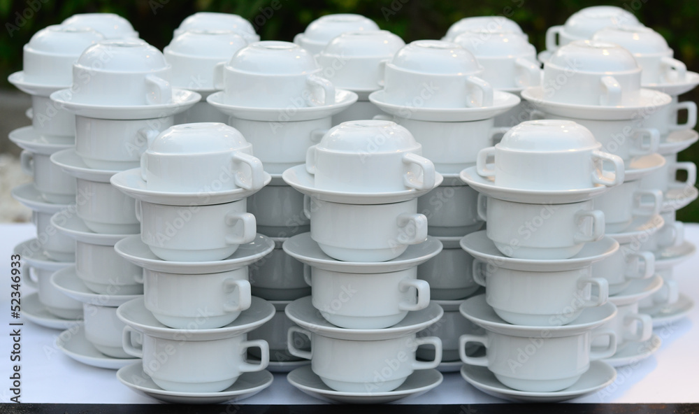 Stacked empty tea or coffee cup prepared for dinner. Stacked empty tea or coffee cup prepared for dinner.