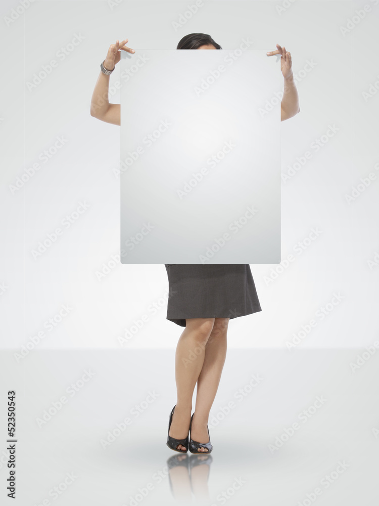 Teenager holding a Blank signboard Teenager holding a Blank signboard