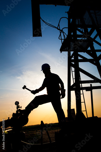 Oil worker silhouette
