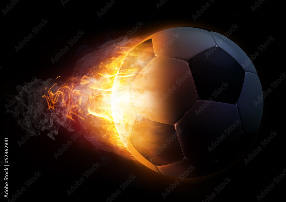 Fototapeta premium Football in Fire on black background