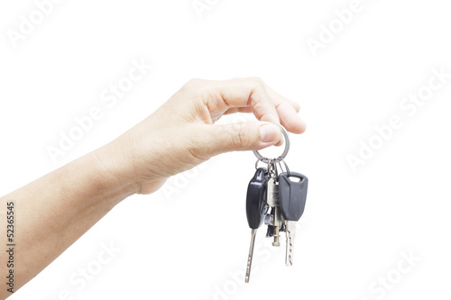 hand holding car key