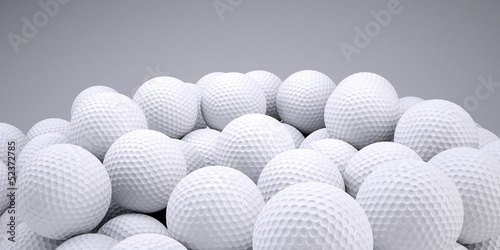 Background is out of golf balls photo