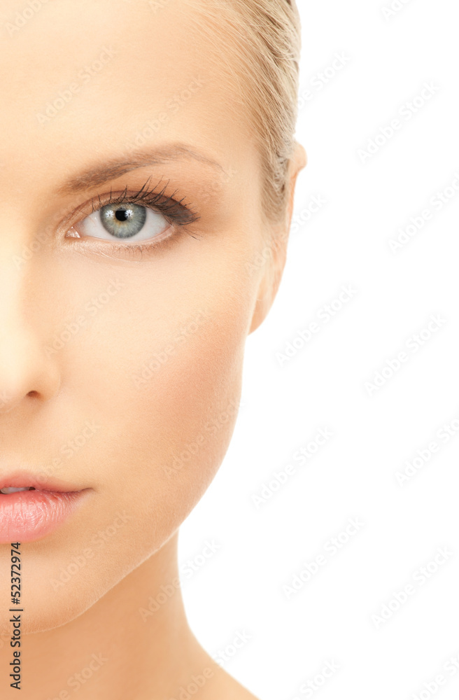 Fototapeta premium half face of beautiful woman