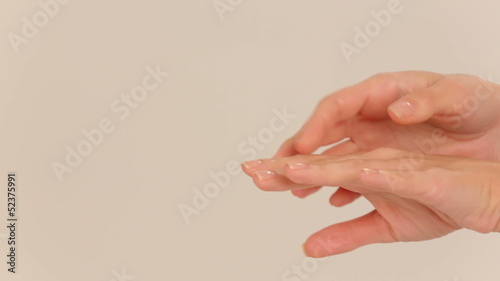 Woman using hand cream