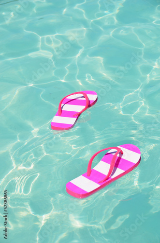 Flip-flops in water © HappyAlex