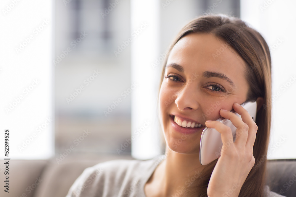 woman on the phone inside at home woman on the phone inside at home