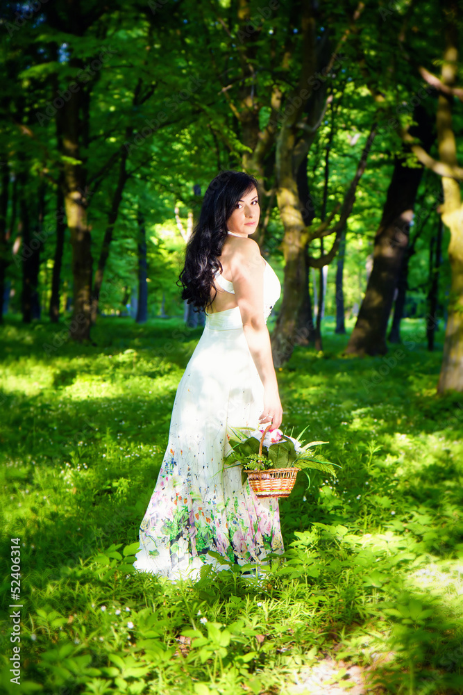 romantic woman in fairy forest