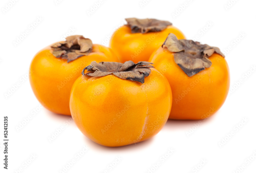 Four persimmon fruits Four persimmon fruits