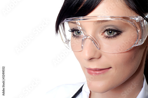 Portrait of female doctor with protective glasses