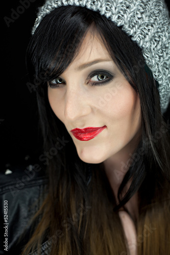 Portrait of a bautiful young woman with red lipstick and grey ha