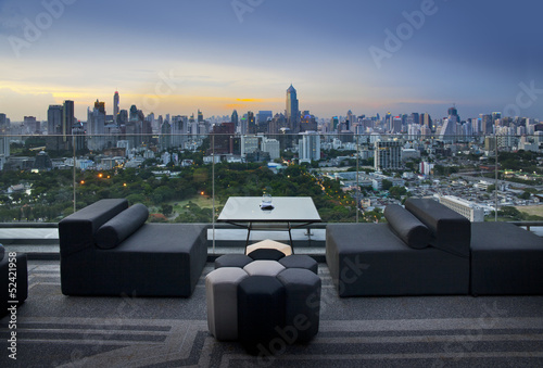 Photography Sofa on terrace overlooking park and building,Bangkok