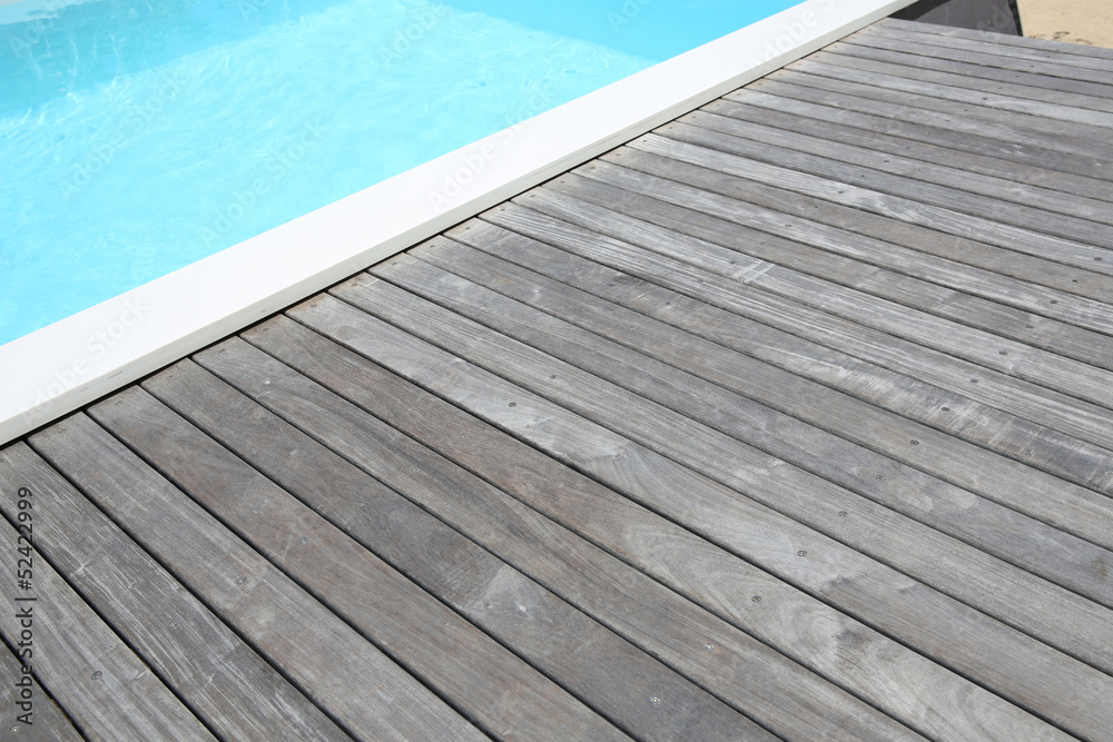 Detail of swimming-pool and wooden deck
