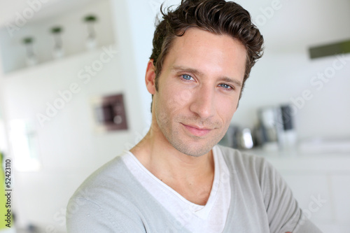 Canvas Print Portrait of handsome man with blue eyes