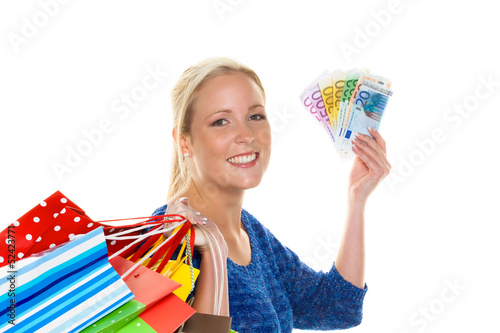 Frau mit Einkaufstaschen beim Shopping photo