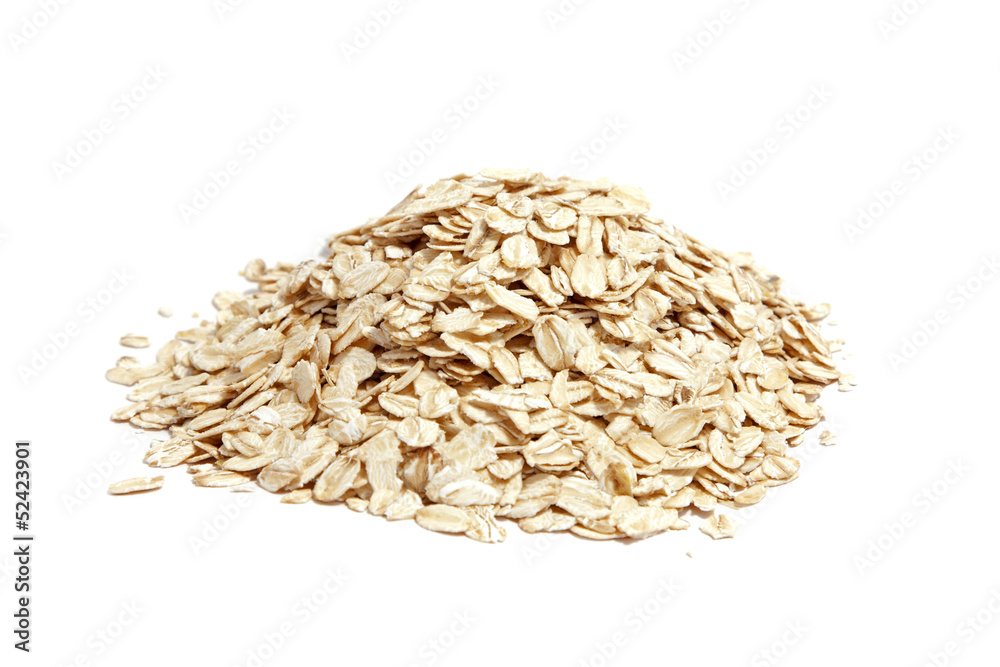Oat flakes pile on white background Oat flakes pile on white background