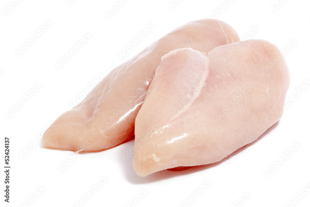 raw chicken breasts on white raw chicken breasts on white