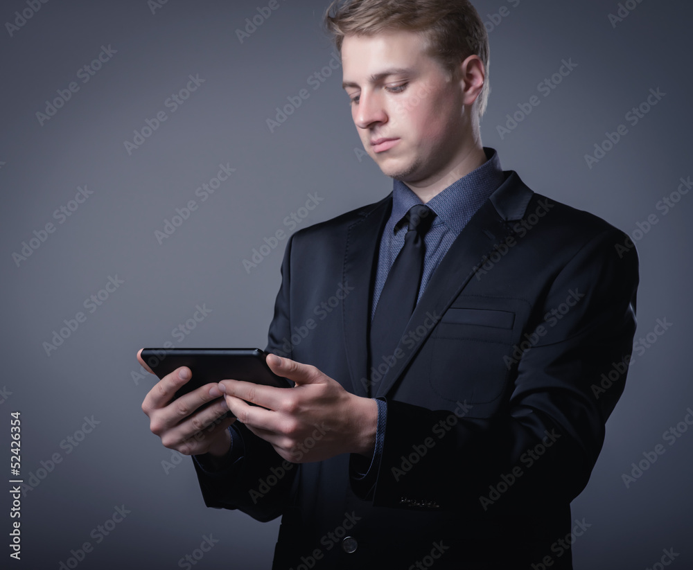 young businessman using a digital tablet young businessman using a digital tablet