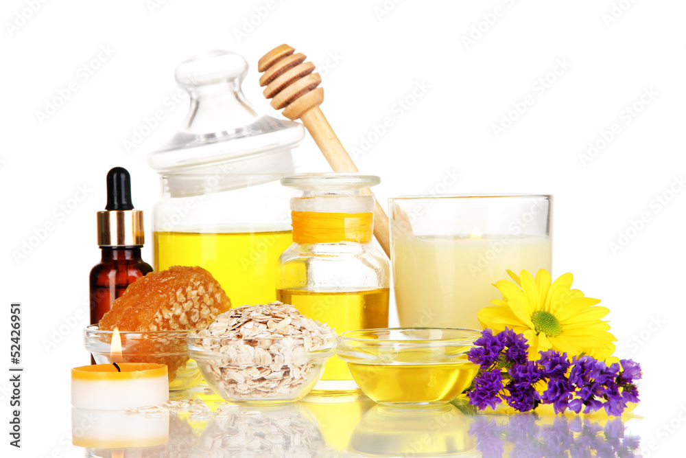 Fragrant honey spa with oils and honey isolated on white