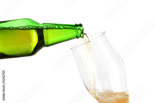 Beer poured into glass isolated on white