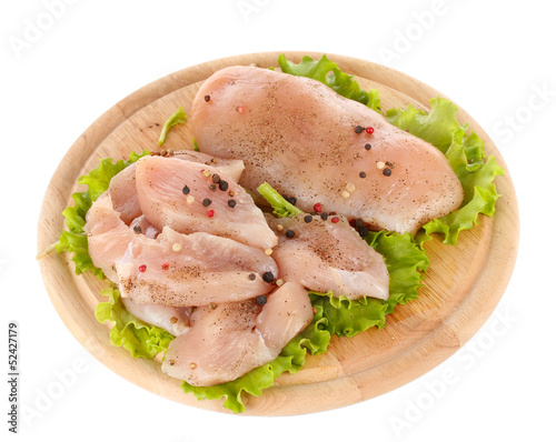 Chicken meat on board isolated on white