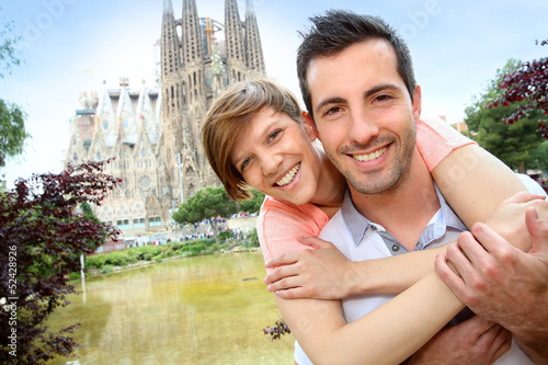 Photography Couple standing by the Sagrada familia church, Spain