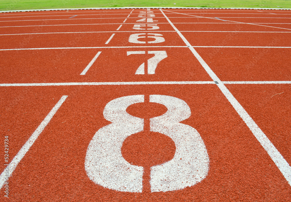 Fototapeta premium numbers on running tracks of outdoor athletic stadium