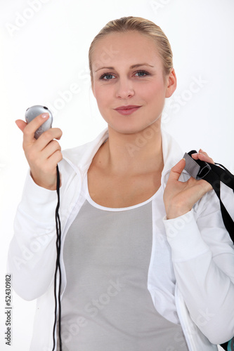 Young woman with stop watch