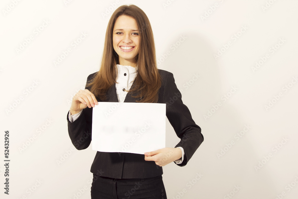 Smiling attractive woman holding blank paper isolated Smiling attractive woman holding blank paper isolated