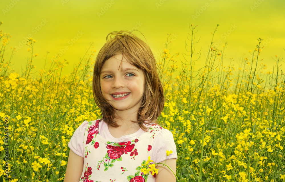 happy little girl on a rapeseed field happy little girl on a rapeseed field