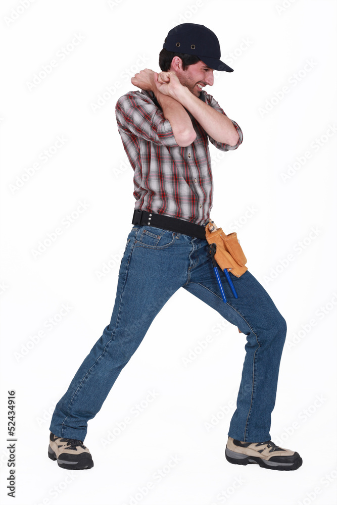 Handyman pulling an invisible object