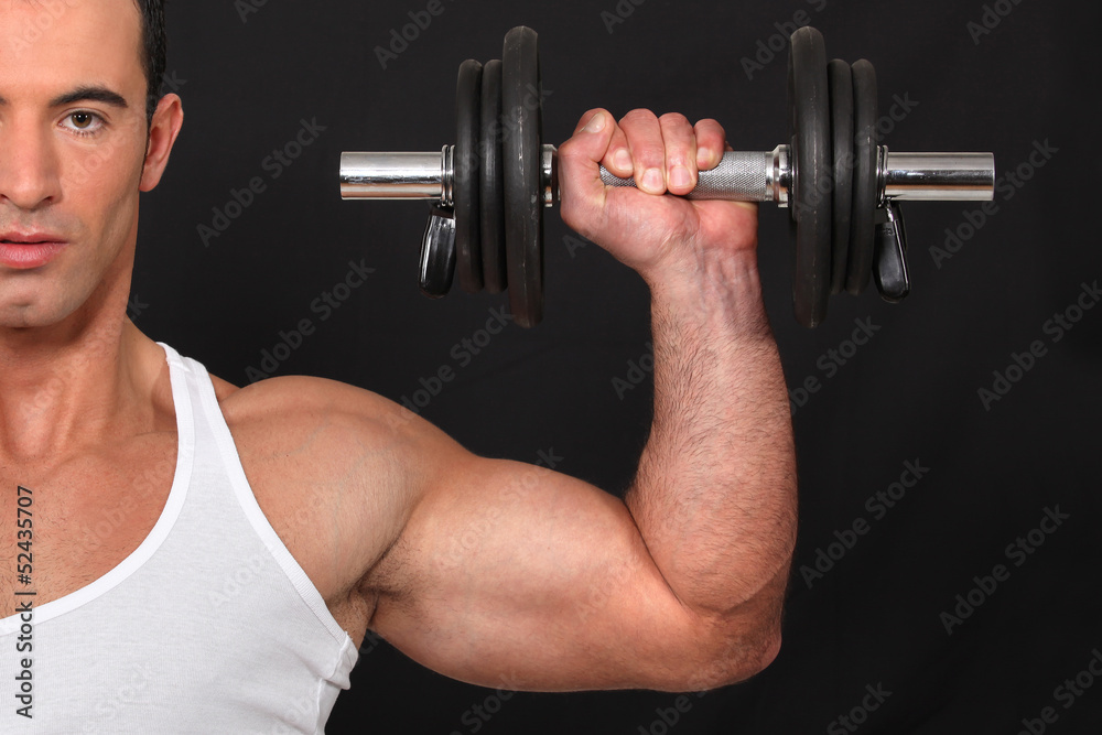 Man lifting weights Man lifting weights
