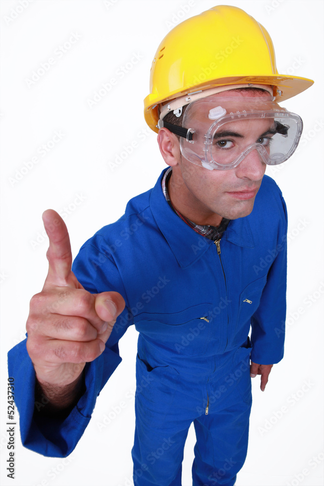 Manual worker with a finger up.
