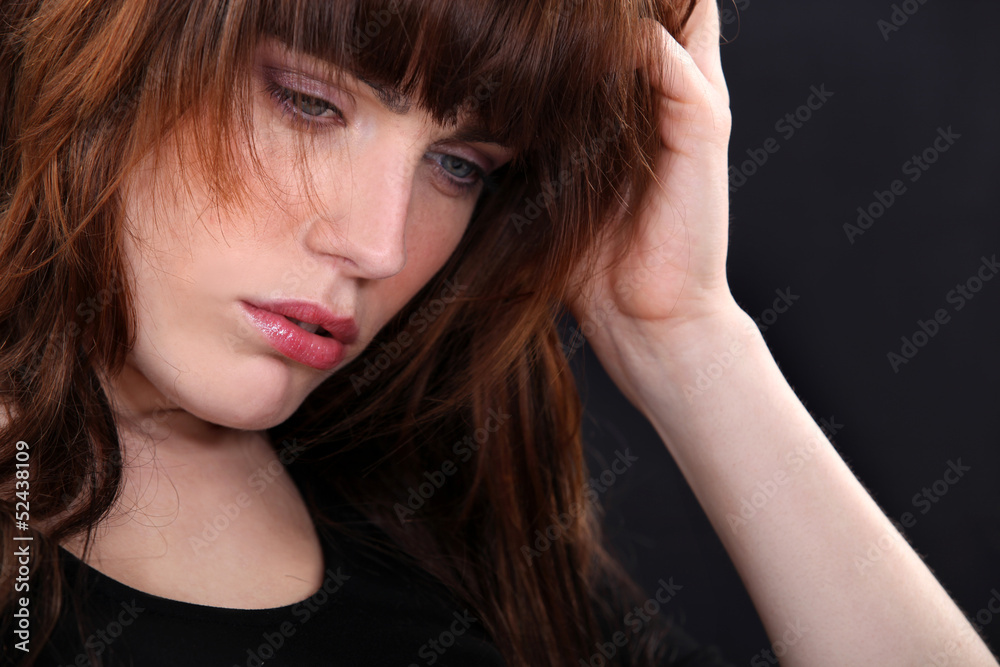 Fototapeta premium young woman looking sad